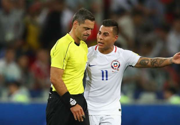 Eduardo Vargas appeals to the referee after Chile's opener against Cameroon was disallowed