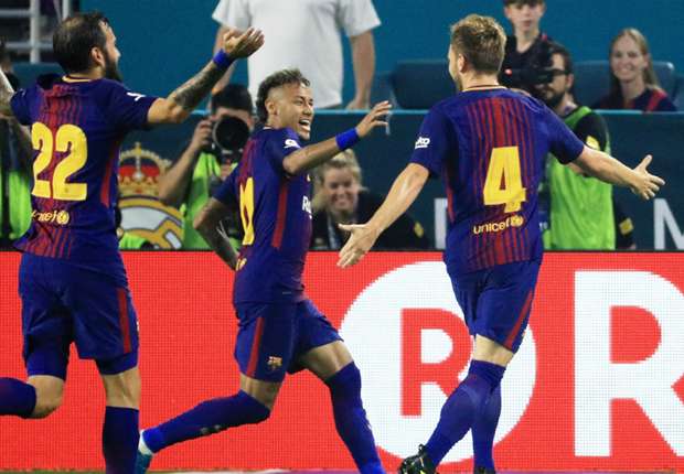Barcelona celebrate a goal against Real Madrid