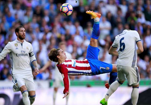Who is favored in the Real Madrid vs. Atletico Madrid match?
