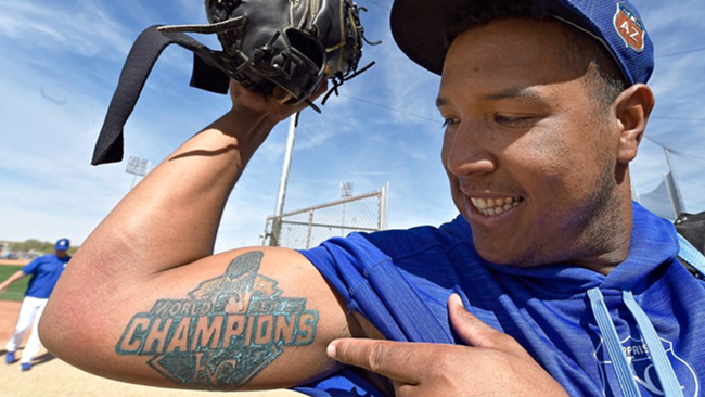 Salvador Perez shows of massive tattoo