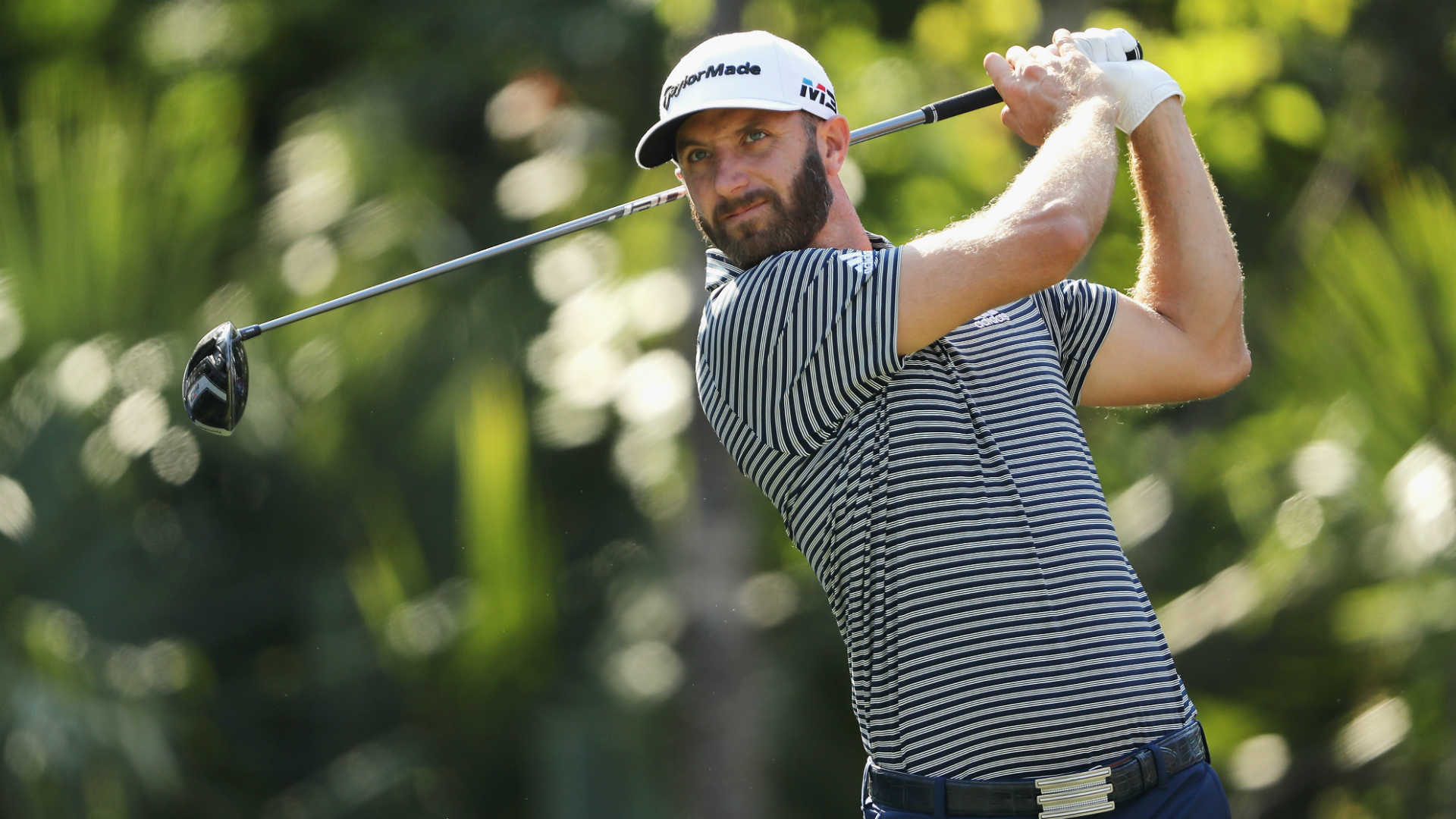 Dustin Johnson shoots 66, shares early lead at Players