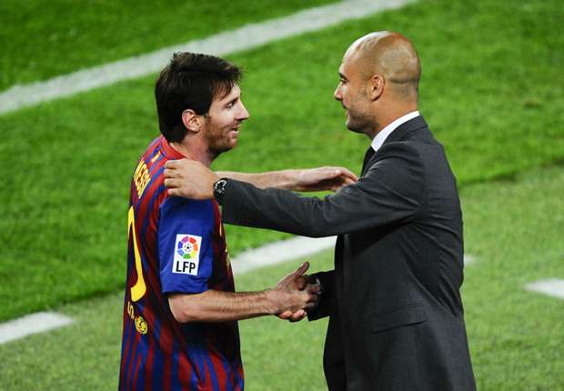 lionelmessipepguardiola-cropped_1h1yros3fkj4u1l3xeby236eb4.jpg