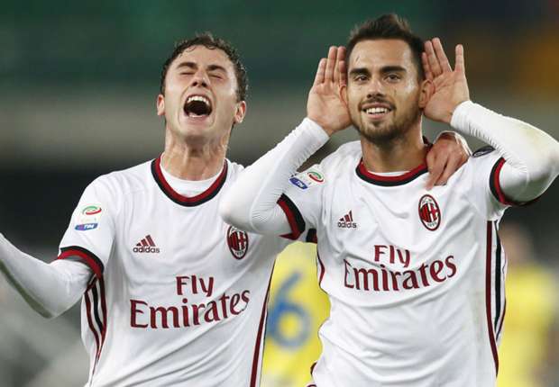 Suso (right) celebrates for AC Milan