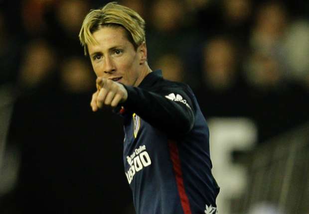Atletico hero Torres refuses to give up title hopes