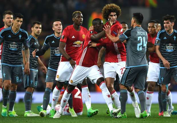 Manchester United and Celta Vigo players clash at Old Trafford