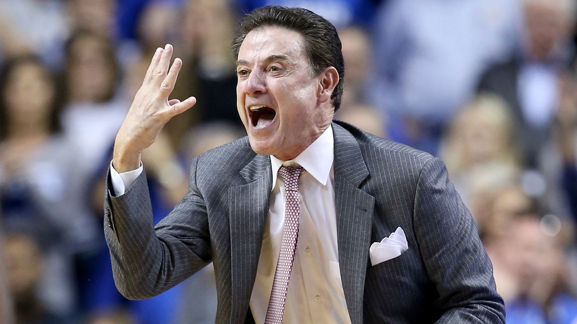 Rick Pitino says Louisville has been 'wronged' in scandal, denies flipping off fans