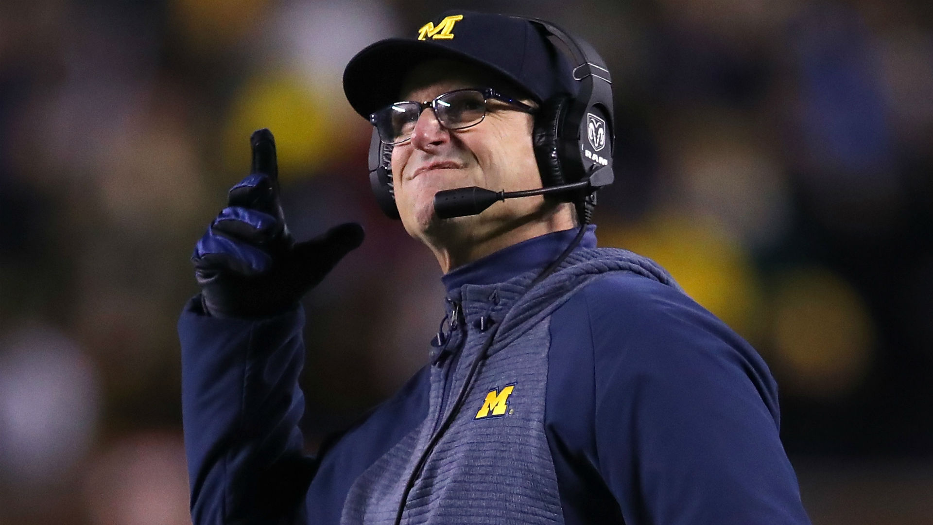 Michigan's Jim Harbaugh offers scholarship to seventh-grade QB