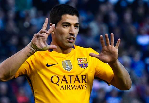 Suarez swings title race back in Barca's favour