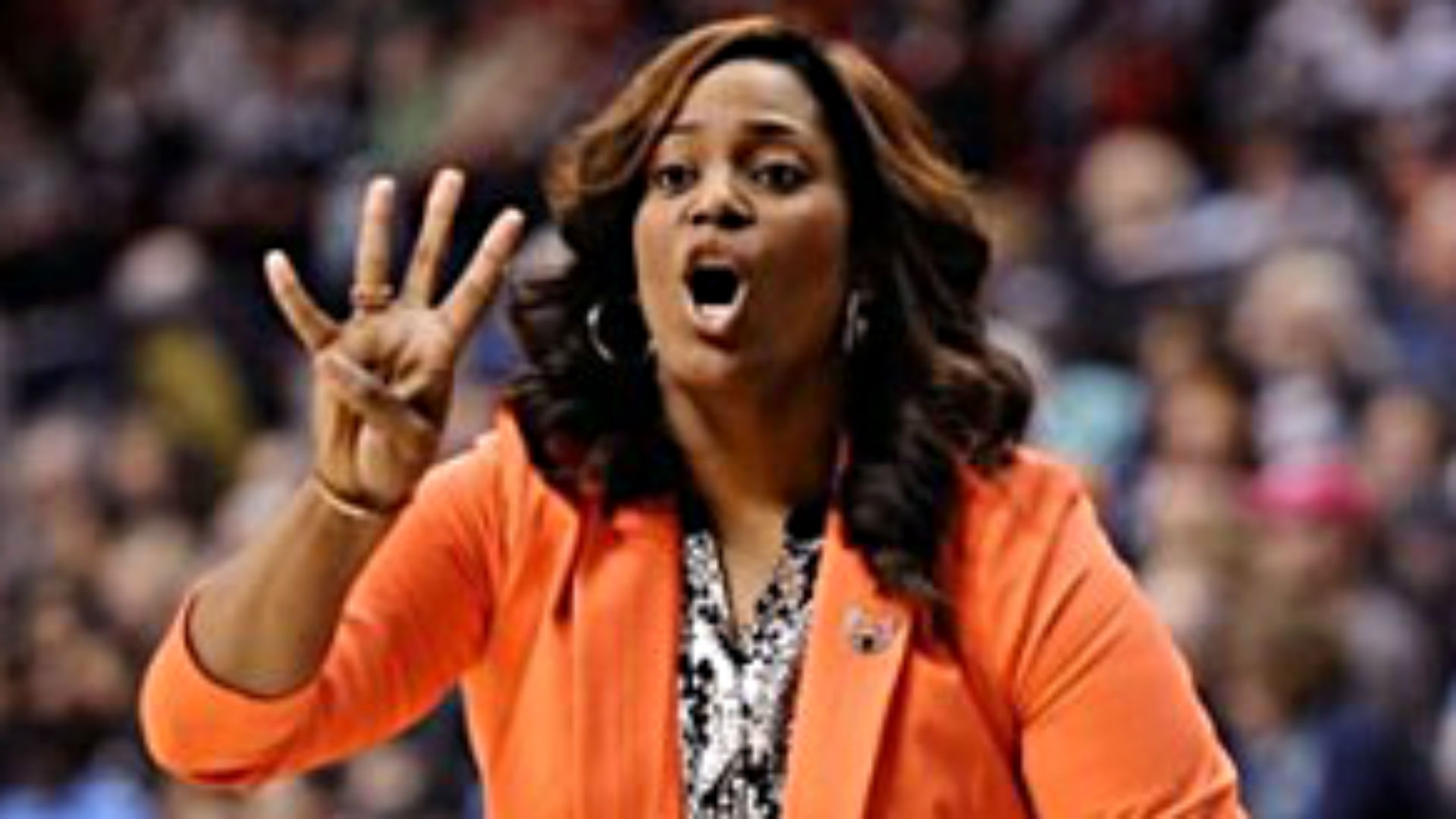 Women's basketball coach fired after suspending two players for dating