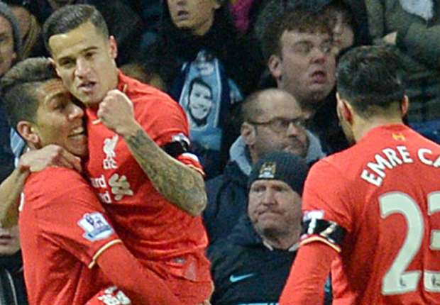 Liverpool trio Roberto Firmino, Philippe Coutinho and Emre Can celebrate