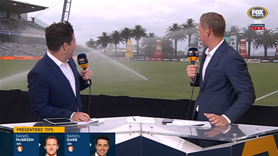 WATCH Football presenters hit by sprinklers Football Sporting News