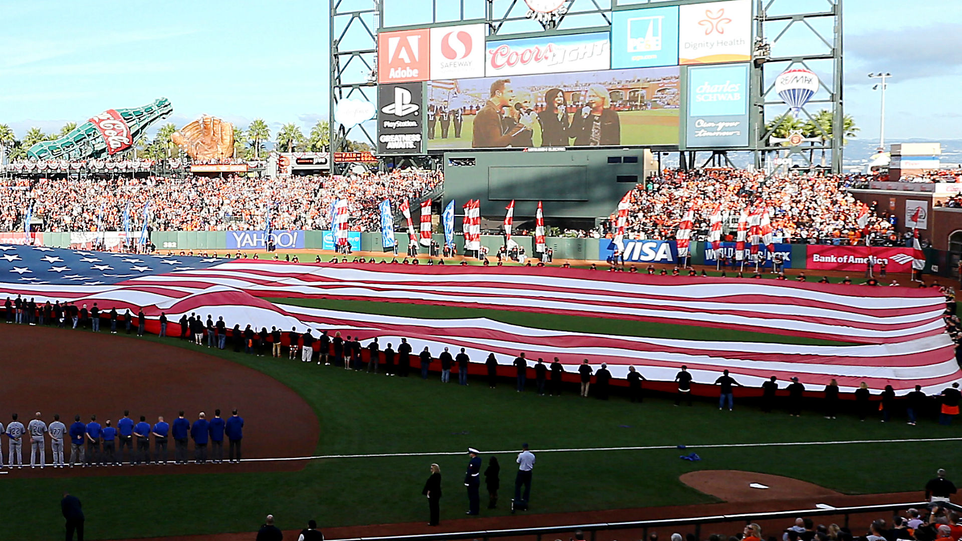 American flag tears during national anthem before Game 3 of World