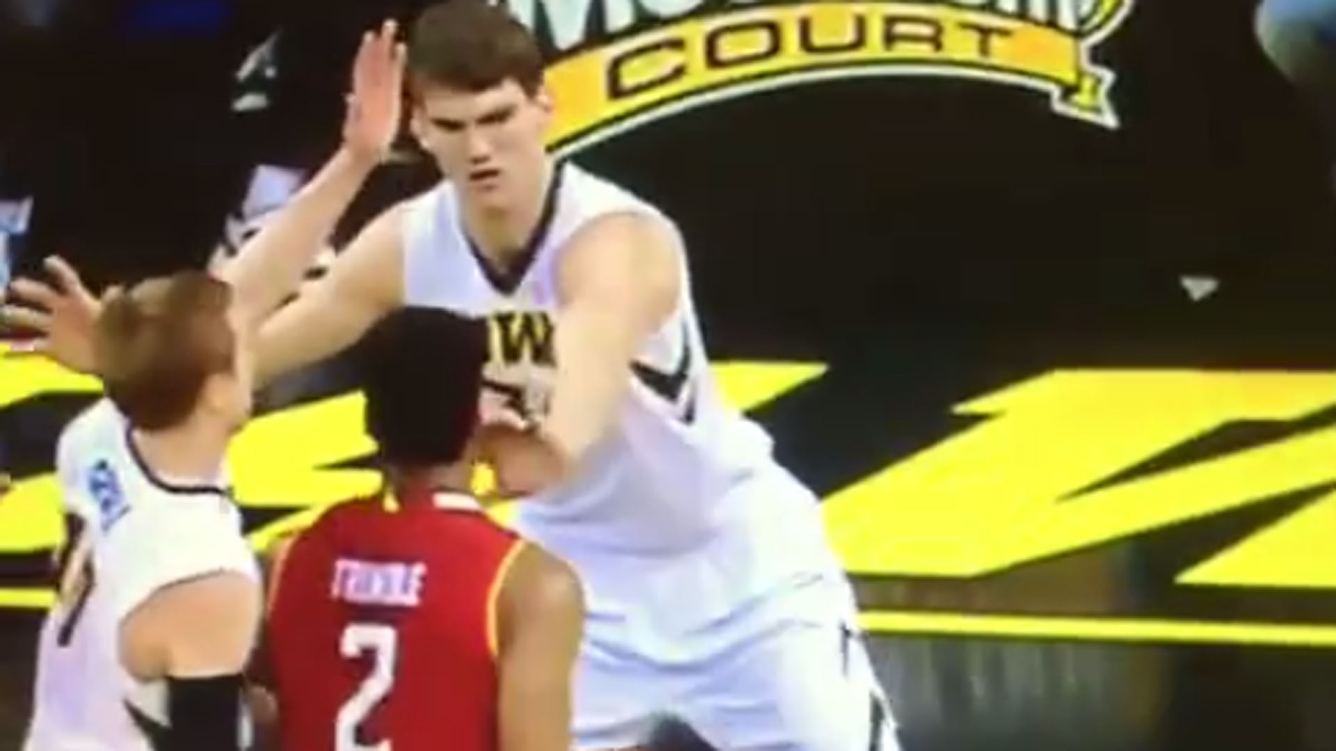 Iowa�s Adam Woodbury poked another player in the eye