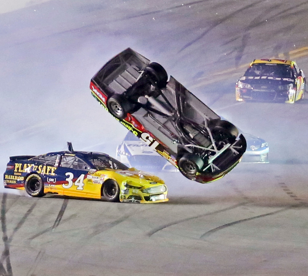 Clint Bowyer's car flips after Johnson causes big wreck at Daytona
