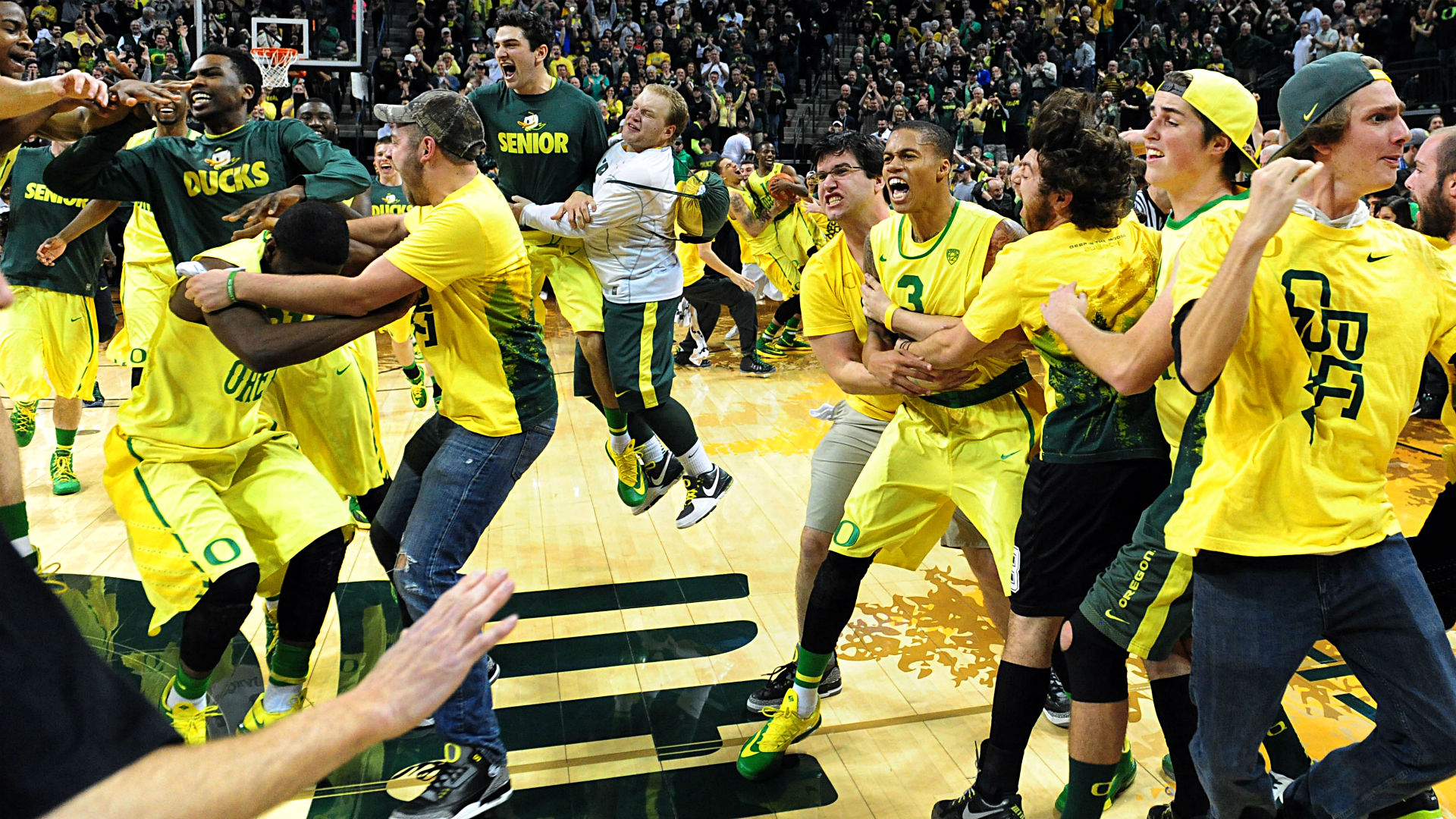 Pac 12 to fine schools up to $100 000 if fans storm court field NCAA