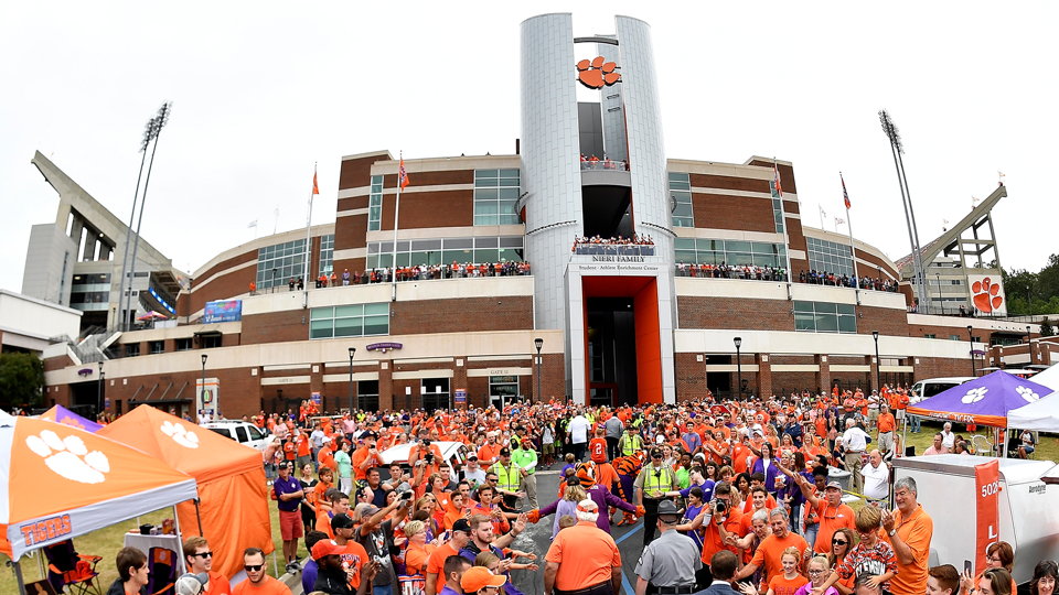 Clemson fans take free tickets reserved for charity and military to