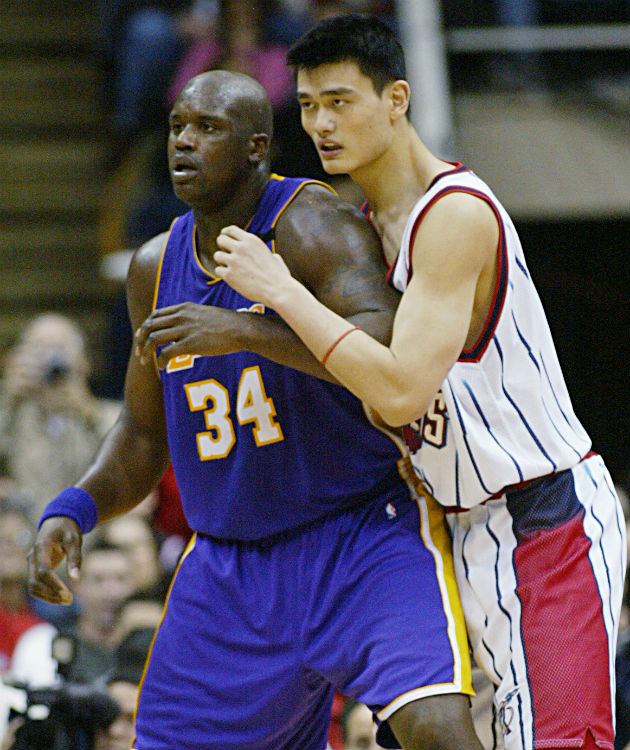 NBA on ESPN - 16 years ago, Shaquille O' Neal met 姚明 Yao Ming on the court  for the first time.
