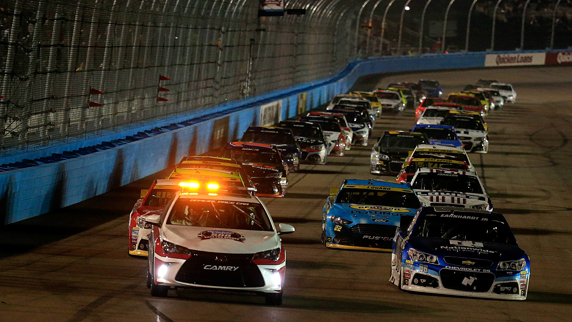 Dale Earnhardt Jr. wins rainshortened race at Phoenix; Chase final four set NASCAR Sporting
