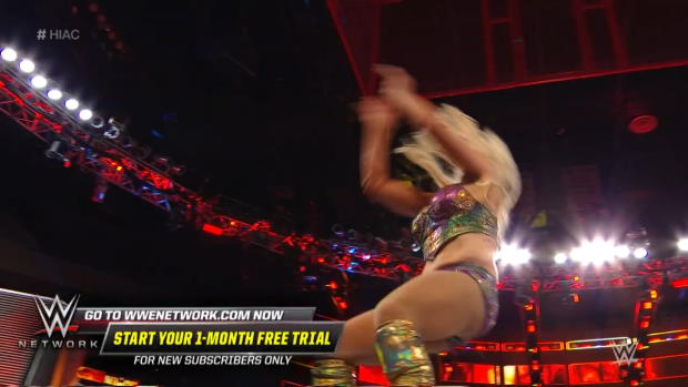 Charlotte Flair reverses Dis-arm-her with a vicious powerbomb: WWE Hell in a Cell 2018 (WWE Network Exclusive) Charlotte Flair reverses Dis-arm-her with a vicious powerbomb: WWE Hell in a Cell 2018 (WWE Network Exclusive)