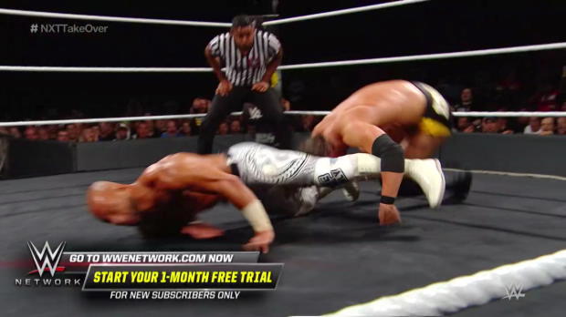 Ricochet's leaping hurricanrana launches Adam Cole off the ring apron: NXT TakeOver: Brooklyn IV (WWE Network Exclusive) Ricochet's leaping hurricanrana launches Adam Cole off the ring apron: NXT TakeOver: Brooklyn IV (WWE Network Exclusive)