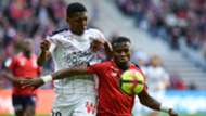 Lille's Youssouf Kone (R) fights for the ball with Bordeaux's Zaydou Youssouf during the French L1 game, 2019.