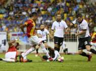 Selangor's Adam Nor Azlin (in red, standing) scores against Pulau Pinang 21/1/2017