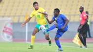 Jamie Webber of South Africa challenged by Yahya Ramadhani of Tanzania