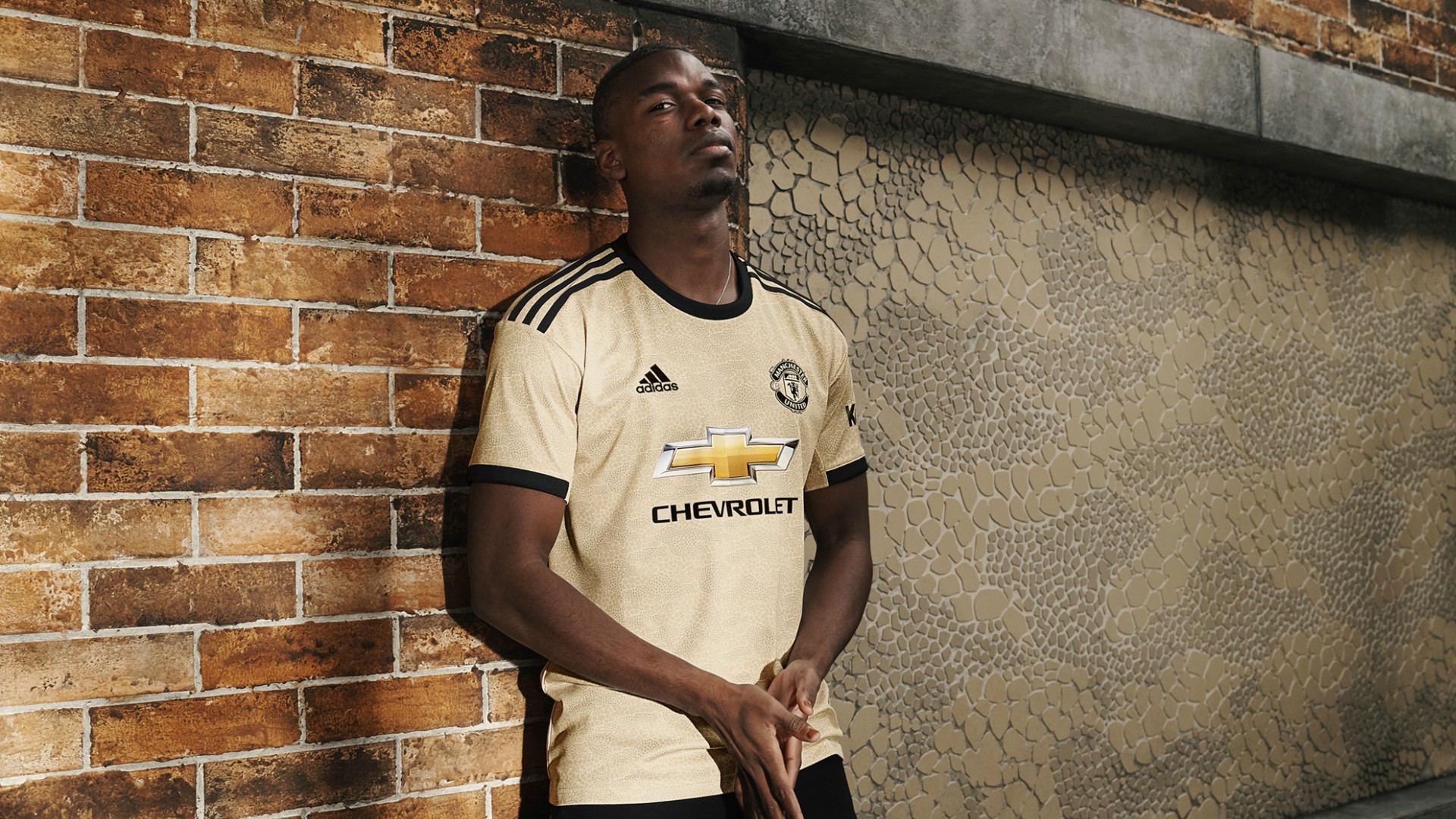 Man Utd new away kit: Paul Pogba models shirt as Real Madrid links ...