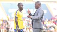KCCA-coach-Mike-Mutebi-R-gives-instructions-to-Muzamir-Mutyaba