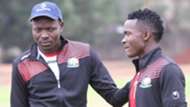 Harambee Stars coach Stanley Okumbi with George Odhiambo of Gor Mahia.