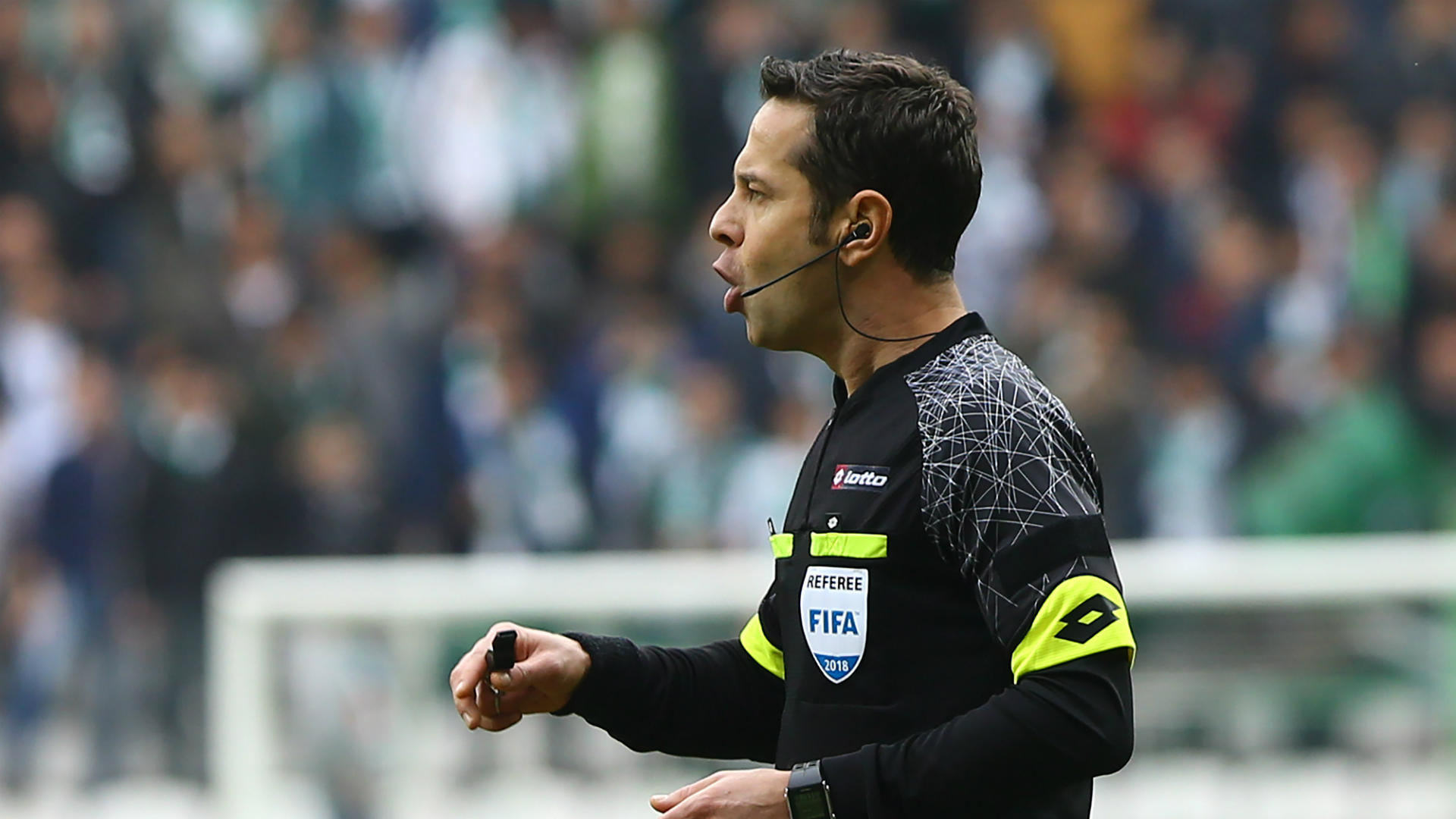 Turkish referee Halis Ozkahya