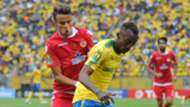 Krahire Zakri of Mamelodi Sundowns challenged by Badr Gaddarine of Wydad Athletic
