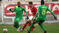 Rami Bedoui of Etoile du Sahel Plateau United Tosin Omoleye and Sunday Ngbede