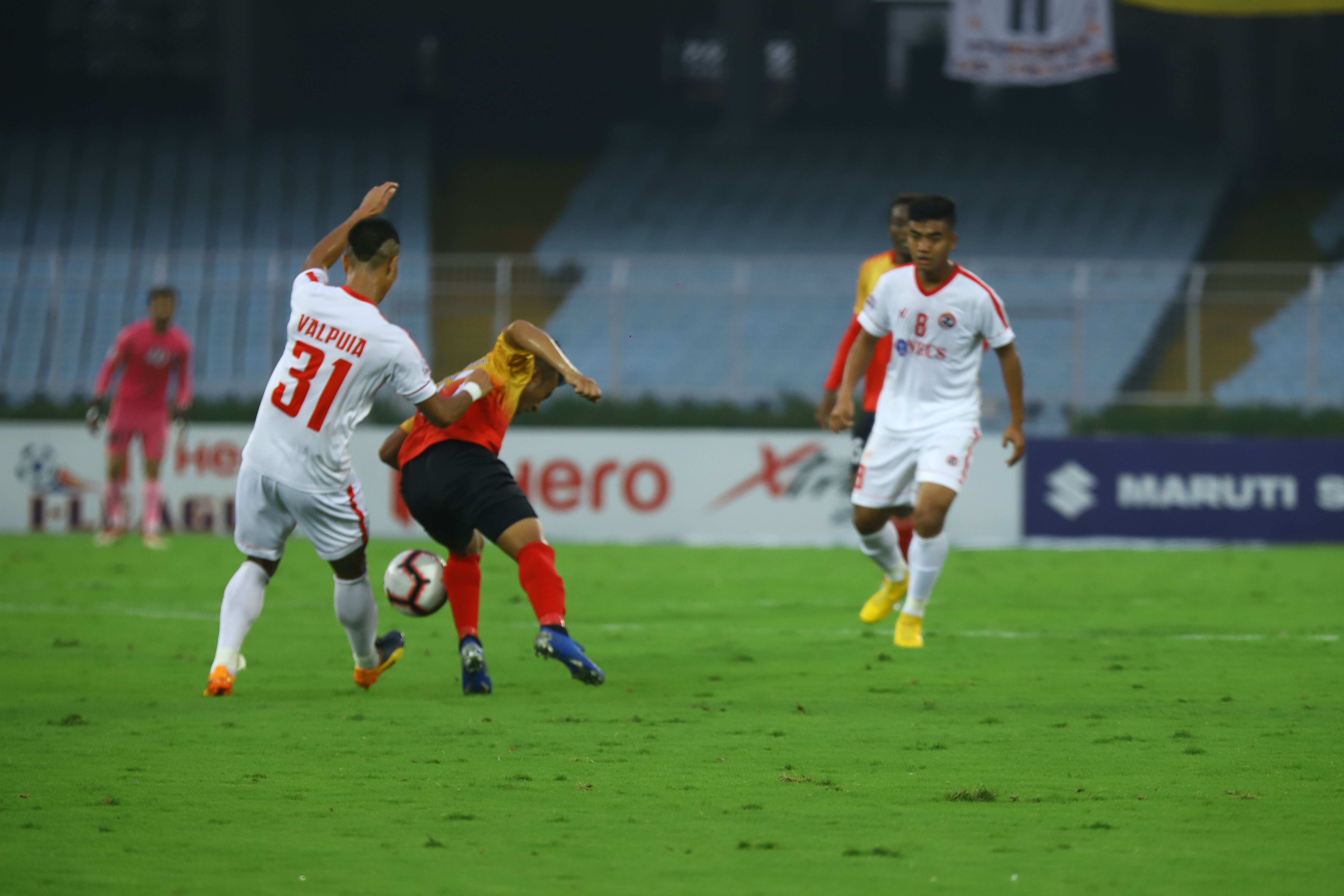 Aizawl FC and East Bengal players tussle for a ball in their I-League encounter (Image Credits- Goal.com)