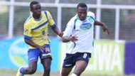 Fredrick Shimonyo of Western Stima tackle Longinus Chibueze of Thika United
