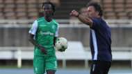 Shafik Batambuze of Gor Mahia and Hassan Oktay.