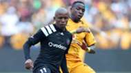 Luvuyo Memela of Orlando Pirates challenged by George Maluleka of Kaizer Chiefs