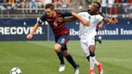 David Accam of Ghana, USA's Kelyn Rowe