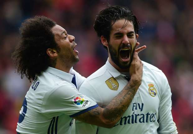 Marcelo ikut gembira setelah Isco mencetak tembakan kemenangan