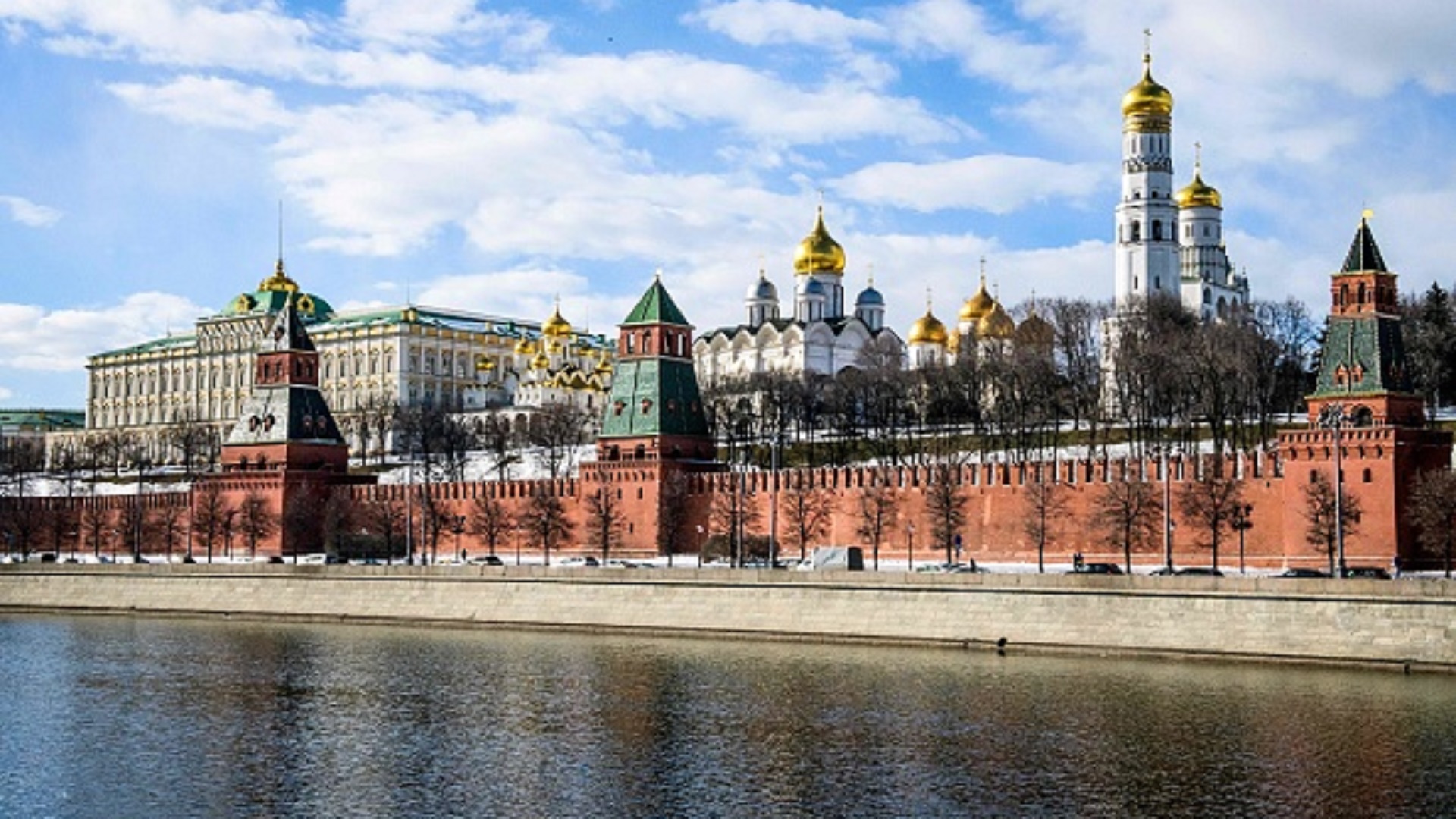 A view of the Moskva river and the Kremlin towers and cathedrals in Moscow