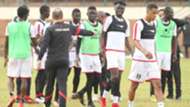 Harambee Stars coach Sebastien Migne and Jesse Were.