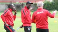 Harambee Stars coach Paul Put and Stanley Okumbi