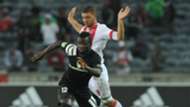 Bernard Morrison of Orlando Pirates is challenged by Grant Margerman of Ajax Cape Town