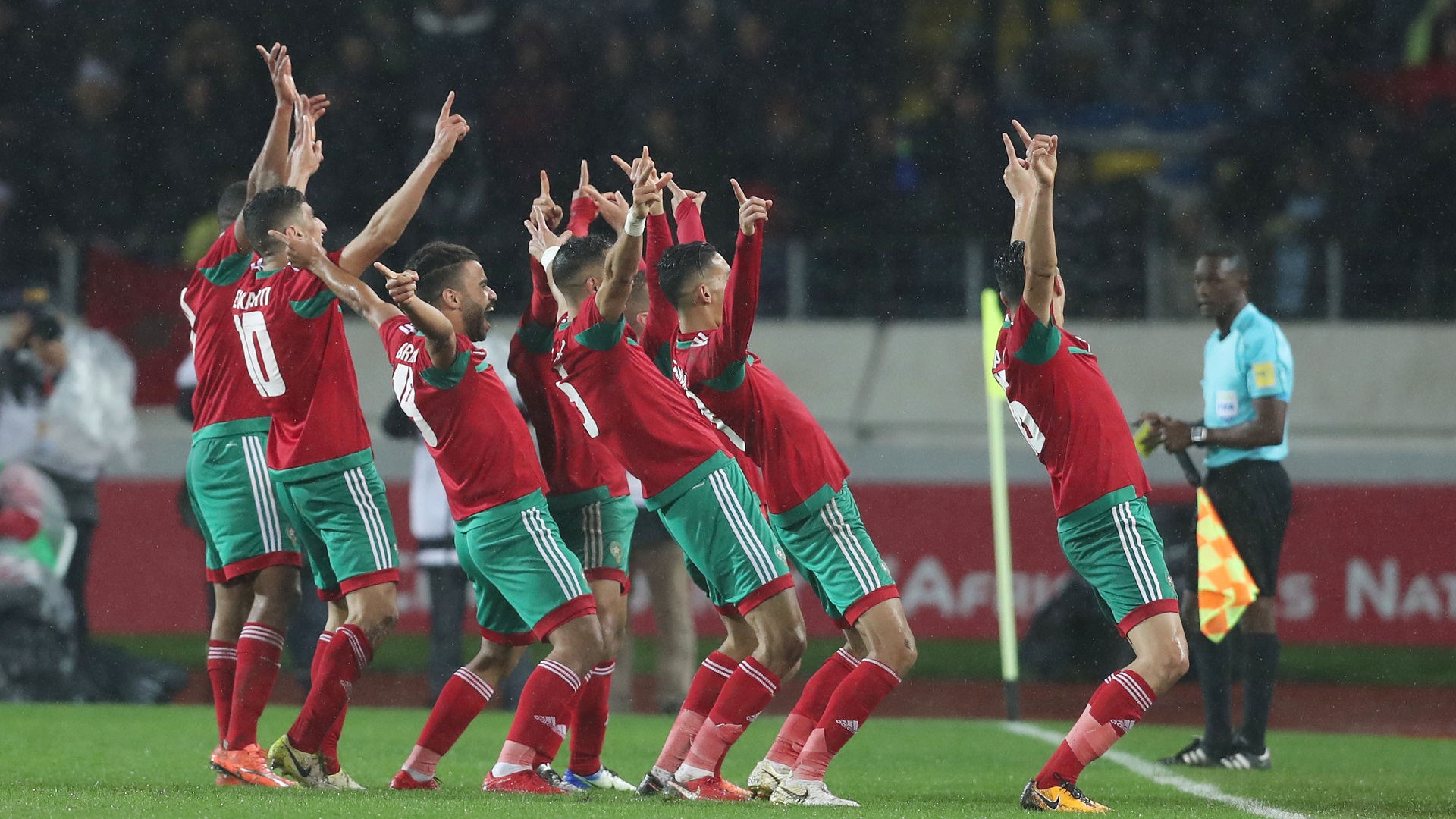 walid-el-karti-leads-morocco-players-in-celebration-during-2018-chan_14yg5p9notm6m1cjmfo7835wqg.jpg