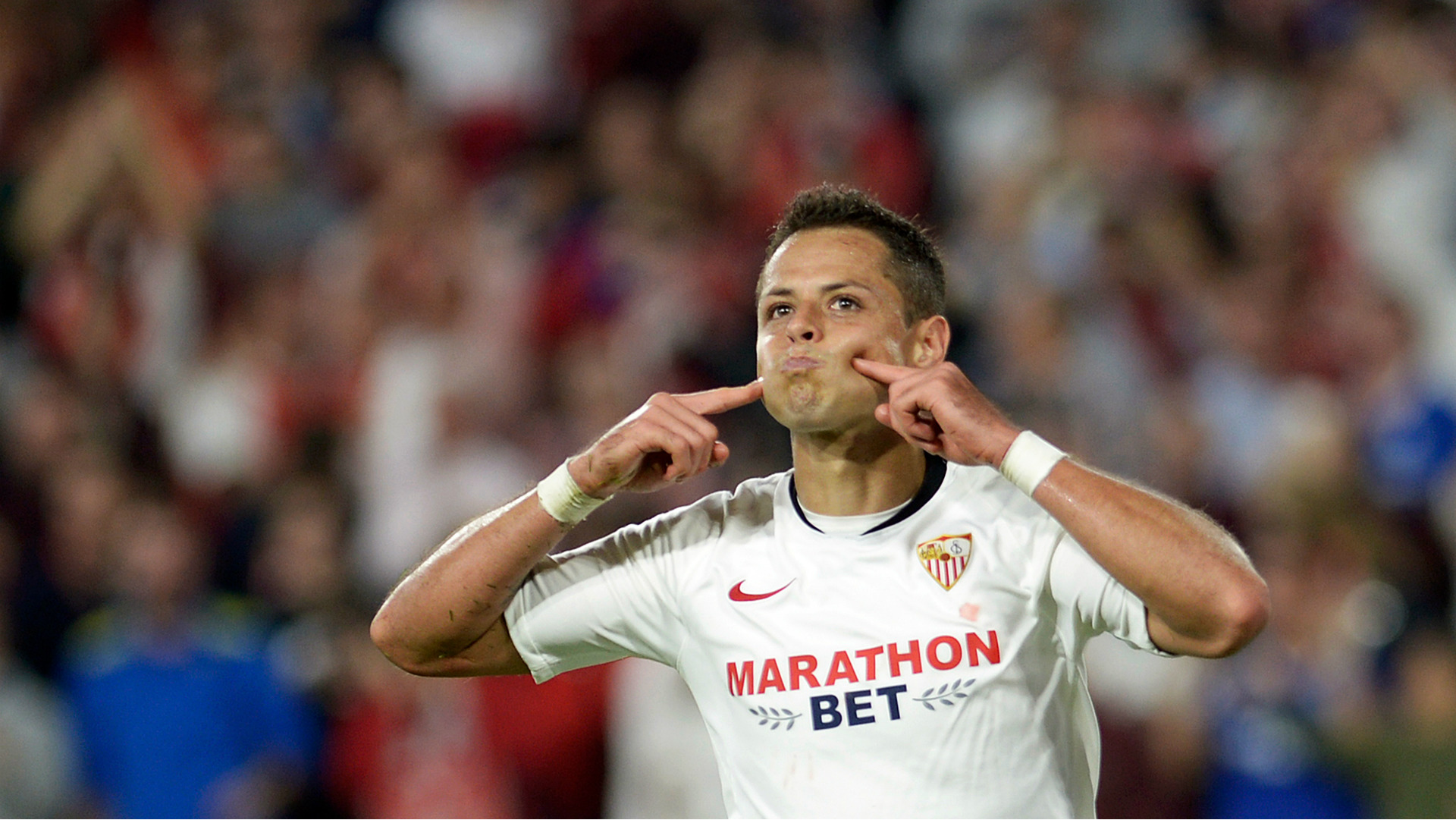 Chicharito happy to give Sevilla boss Lopetegui selection headache ...