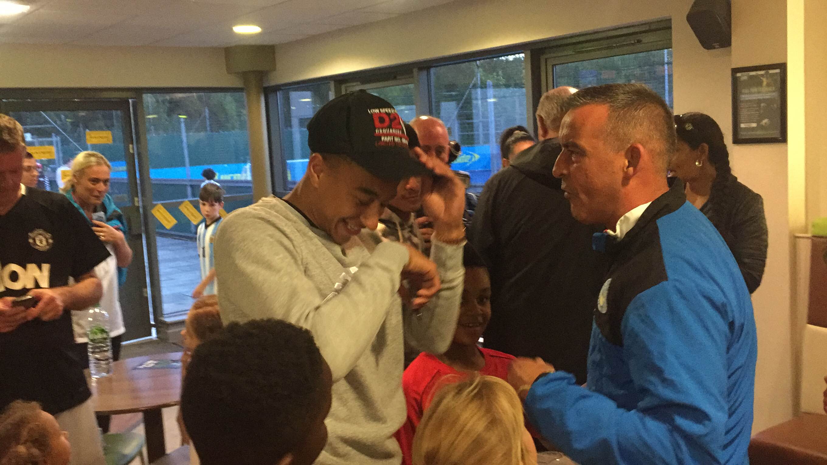 The Manchester United winger showed up at his old youth side on Friday night to hand out club branded jackets and sign autographs The Manchester United winger showed up at his old youth side on Friday night to hand out club branded jackets and sign autographs