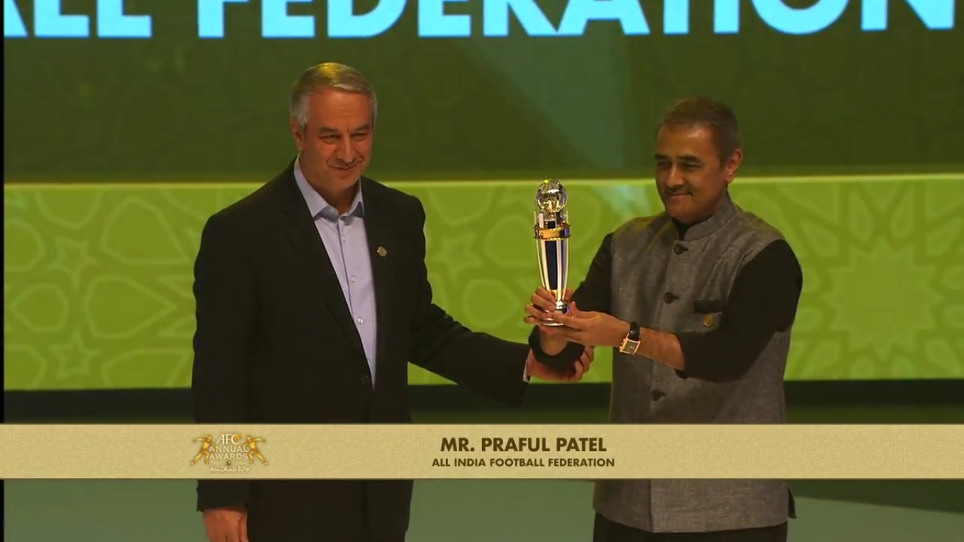 Praful Patel Kushal Das and Subrata Dutt posing with the coveted award in AFC Annual Awards Abu Dhabi 2016