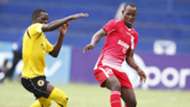 Tusker defender James Situma v Musa Mudde of Bandari