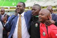Cabinet Secretary Hassan Wario embraces with FKF President Nick Mwendwa at the final whistle