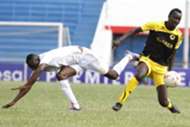 Humprey Mieno outpaces Yusuf Mohammed of Muhoroni Youth for the ball on Friday